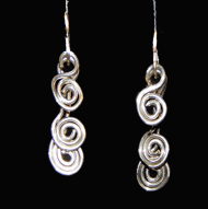 Silver dancing spiral earrings